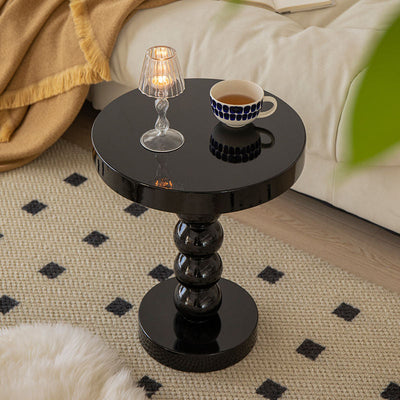 Table basse en bois massif de forme ronde contemporaine pour salon 