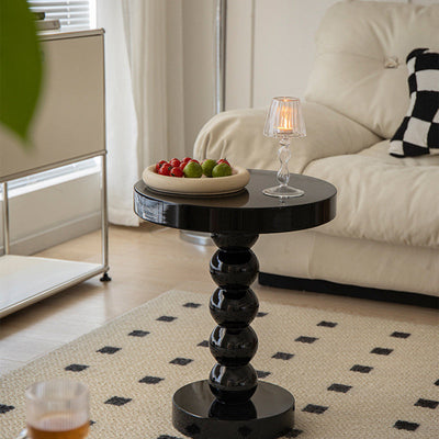Table basse en bois massif de forme ronde contemporaine pour salon 