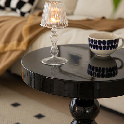 Table basse en bois massif de forme ronde contemporaine pour salon 