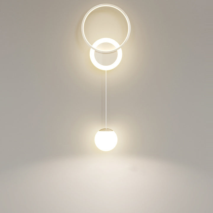 Applique murale LED en fer et acrylique à boule ronde de simplicité moderne pour chevet 