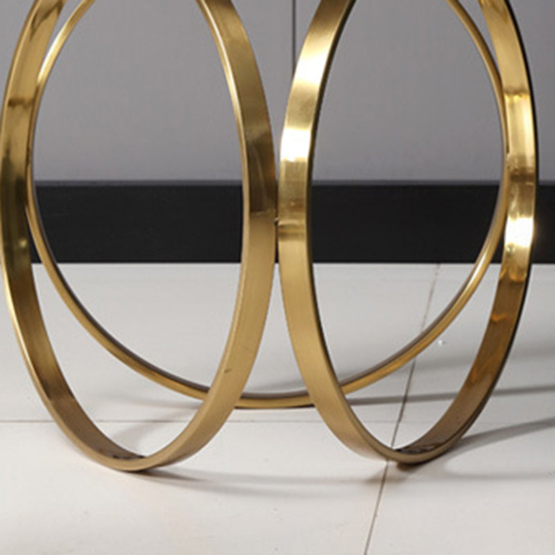 Table basse moderne de luxe en marbre avec base ronde en titane et acier inoxydable pour salon 