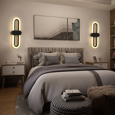 Applique murale LED en fer acrylique ovale de simplicité contemporaine pour salon 