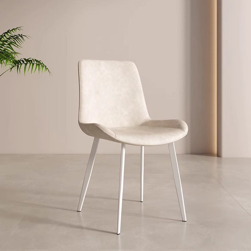Chaise de salle à manger contemporaine en cuir scandinave en acier au carbone avec dossier carré incurvé en éponge pour salle à manger 