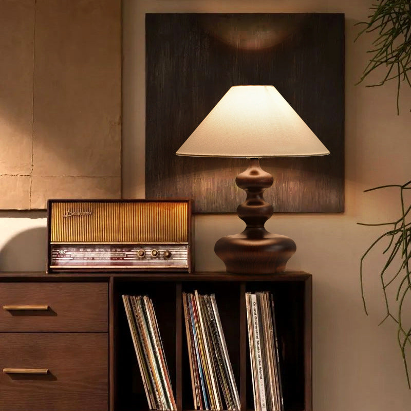 Lámpara de mesa contemporánea retro de madera de fresno y lino con pantalla trapezoidal redonda de 1 luz para dormitorio 