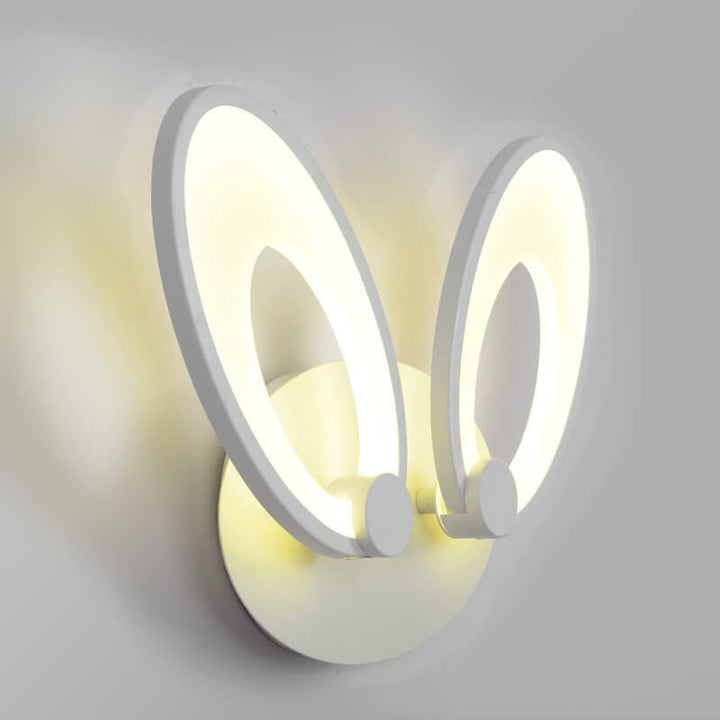 Moderne minimalistische ovale Eisen-Acryl-Backlack-LED-Wandleuchte 