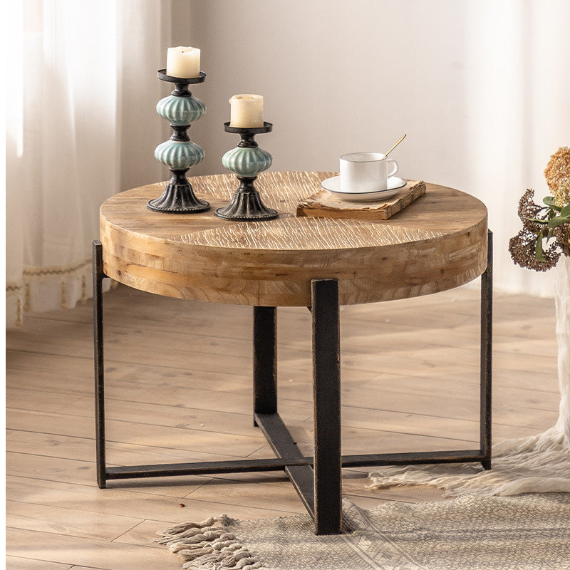 Traditioneller runder Vintage-Couchtisch aus MDF-Holz mit Used-Look und Eisen-Kreuzbeinen für das Wohnzimmer 