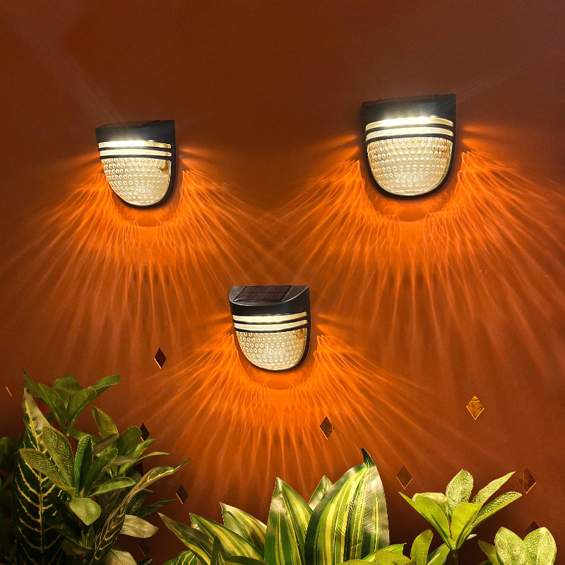 مصباح حائط LED عصري بسيط مقاوم للماء يعمل بالطاقة الشمسية مصنوع من ABS وPC بتصميم خلية نحل بيضاوي للاستخدام في الفناء الخارجي 