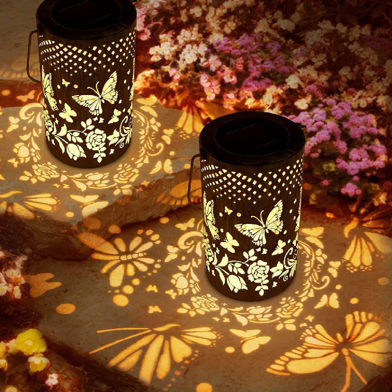 Iluminación de paisaje colgante LED de cilindro de hierro impermeable solar de granja tradicional con flores huecas para jardín 