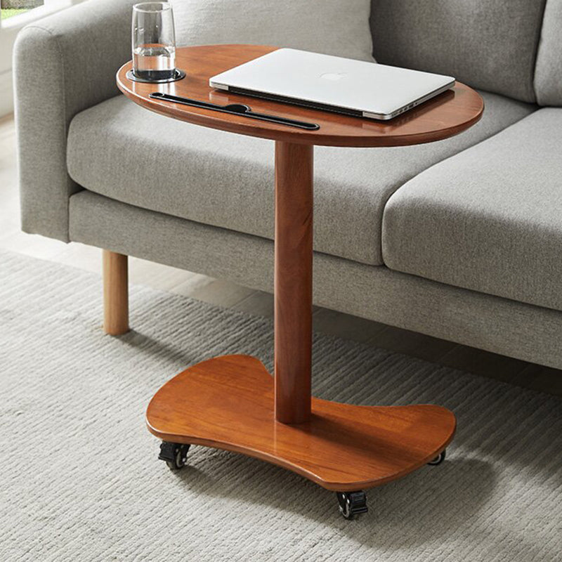 Table basse ovale minimaliste moderne en bois massif et plastique à 4 roues pour salon 