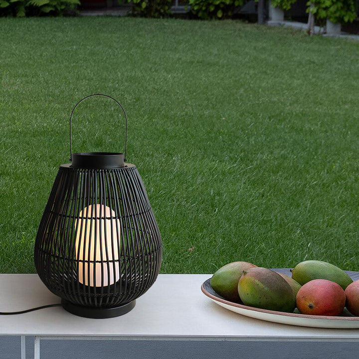 Moderner Outdoor-Rattan-gewebter, käfigförmiger 1-Licht-Außenlandschaftslicht 
