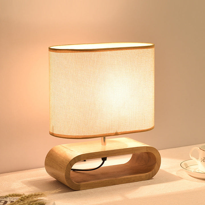 Lámpara de mesa contemporánea nórdica de cilindro de tela de madera elíptica de 1 luz para estudio 