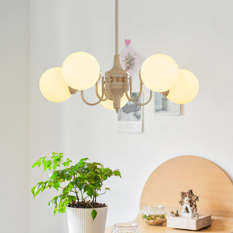 Lustre contemporain rétro à branches courbées avec tige ronde et boules en fer et verre 3/5 lumières pour salon 
