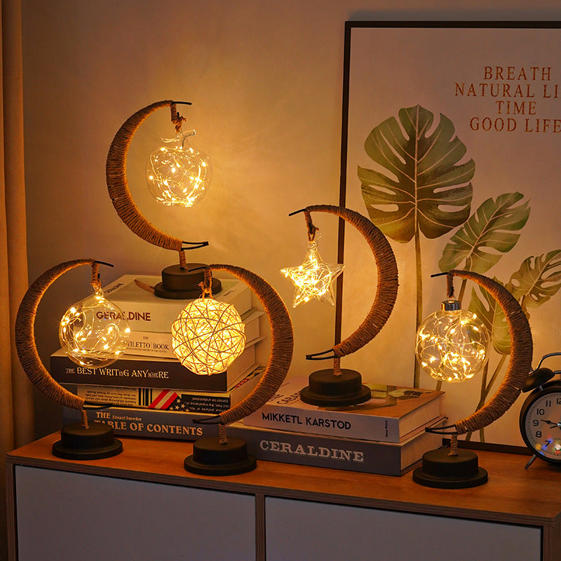 Moderne dekorative Mondkugel Sterne Eisen Kunststoff Rattan Batterie USB Tischlampe 