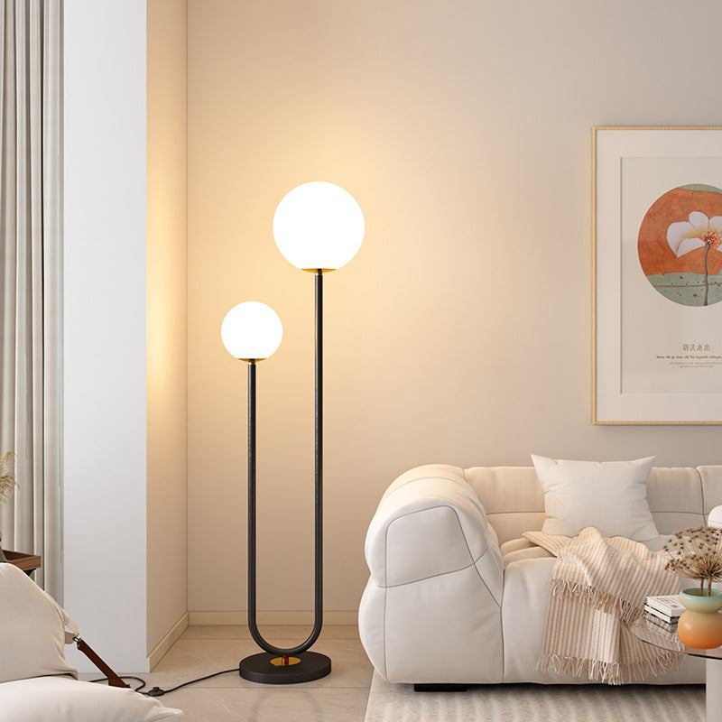 Moderner minimalistischer langer runder Ball Eisen Glas 2-Licht Stehlampe für Schlafzimmer 