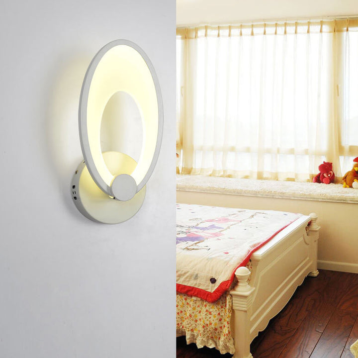 Moderne minimalistische ovale Eisen-Acryl-Backlack-LED-Wandleuchte 