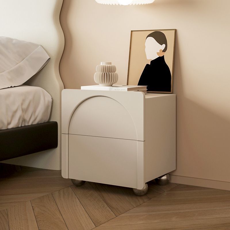 Table de nuit moderne minimaliste rectangulaire avec base ronde en acier au carbone et 2 tiroirs pour chambre 