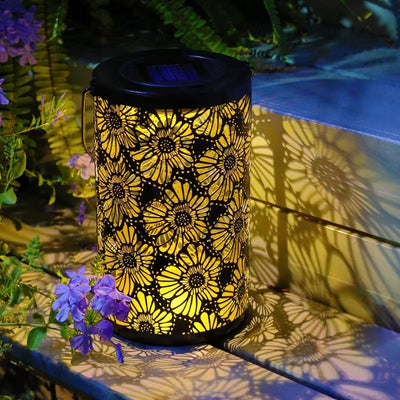 Iluminación de paisaje colgante LED de cilindro de hierro impermeable solar de granja tradicional con flores huecas para jardín 