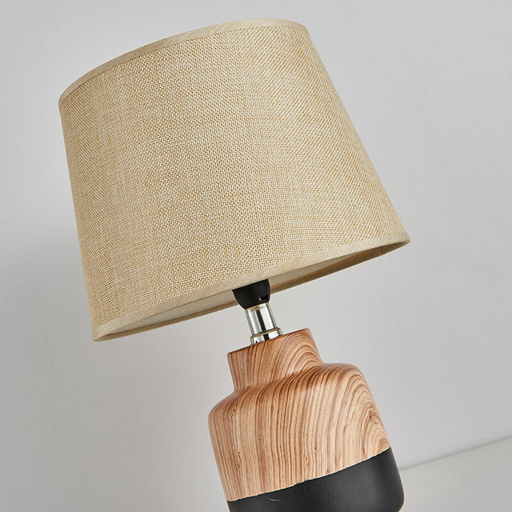 Moderne minimalistische Holzmaserung Stoff Keramik 1-Licht Tischlampe 