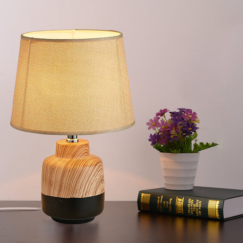 Moderne minimalistische Holzmaserung Stoff Keramik 1-Licht Tischlampe 