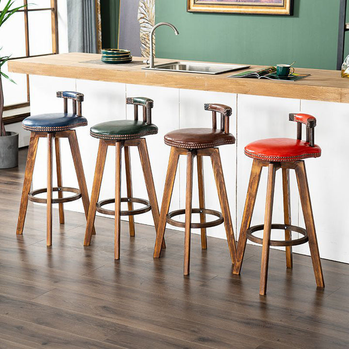 Tabouret de bar pivotant contemporain rétro rond en similicuir avec pieds en bois, dossier bas et repose-pieds pour salle à manger 