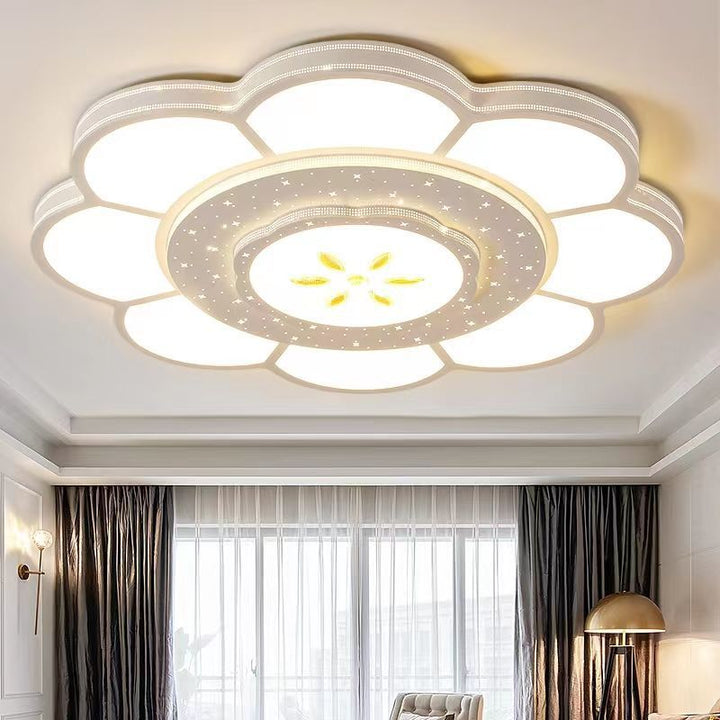 Plafonnier LED rond en fer et acrylique à fleurs de simplicité moderne pour salon 