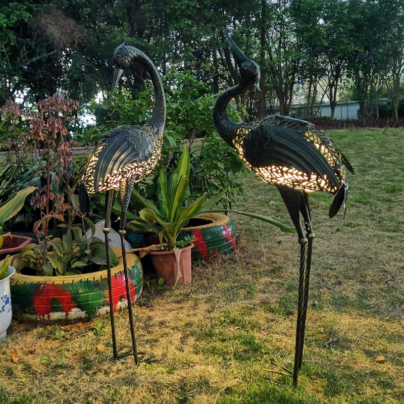 Zeitgenössische kreative Eisen Tier Kran LED Solar wasserdicht Rasen Landschaft Licht für Terrasse im Freien 