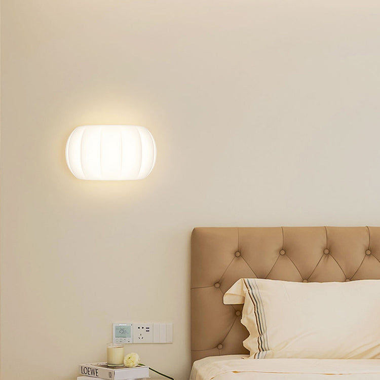 Applique murale LED elliptique en forme de citrouille en fer et acrylique de simplicité moderne pour chevet 