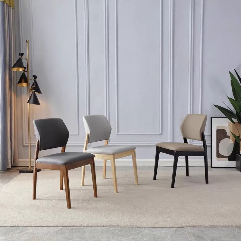 Chaise de salle à manger contemporaine nordique en similicuir rembourré avec dossier ouvert sans accoudoirs pour salle à manger 