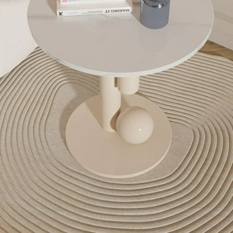 Zeitgenössischer kreativer runder Zylinder-Orb-Felsplatte-Kaffeetisch aus Kohlenstoffstahl für das Wohnzimmer 