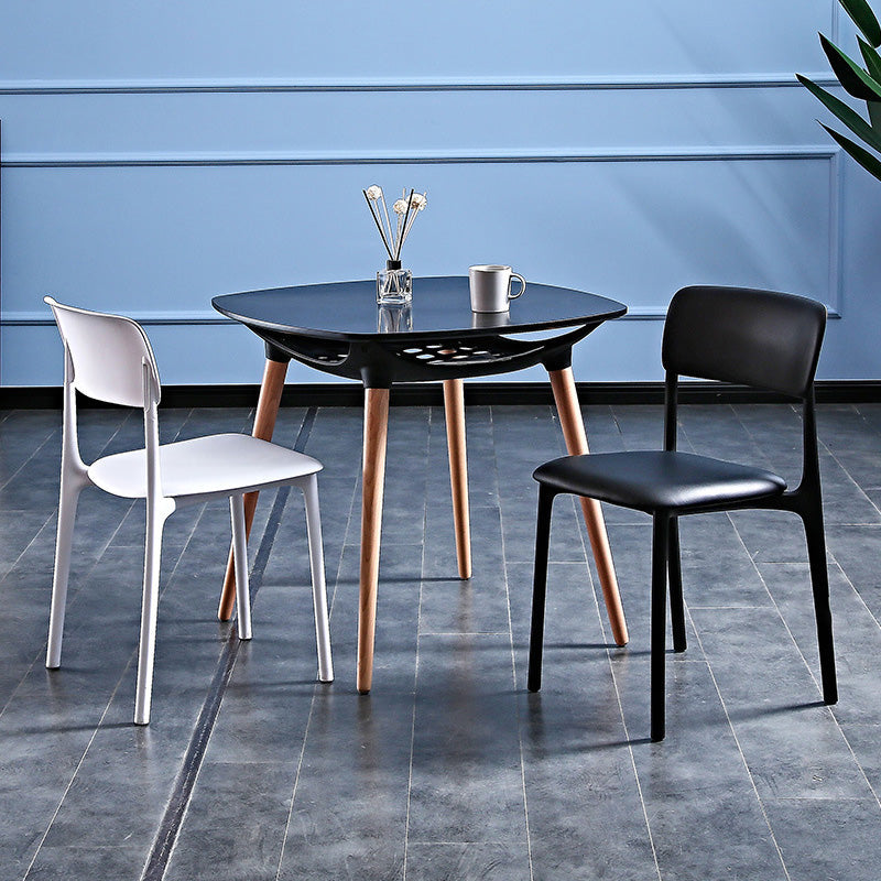 Table à manger contemporaine à coins ronds en verre carré avec pieds en bois massif pour salle à manger 
