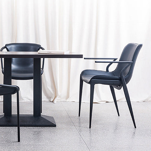 Chaise de salle à manger en cuir et métal avec dossier trapézoïdal minimaliste moderne pour salle à manger 