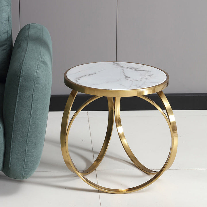 Table basse moderne de luxe en marbre avec base ronde en titane et acier inoxydable pour salon 