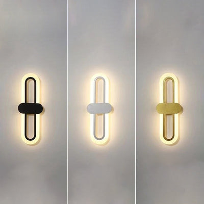 Applique murale LED en fer acrylique ovale de simplicité contemporaine pour salon 