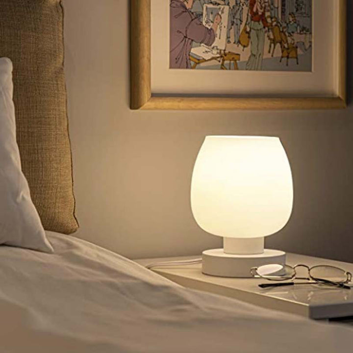 Moderne minimalistische flache runde Glaseisen 1-Licht Tischlampe für Wohnzimmer 