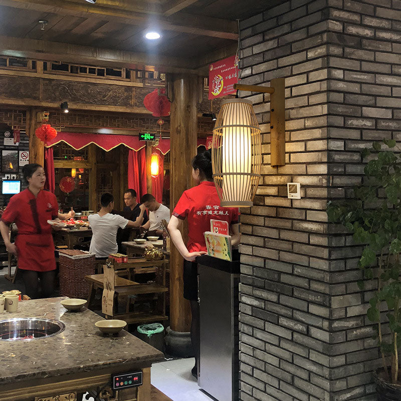Traditionelle chinesische Weberei Bambuskäfig Form 1-Licht Wandleuchte für Wohnzimmer 