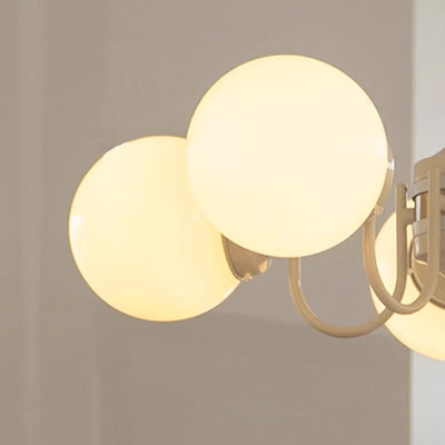 Lustre contemporain rétro à branches courbées avec tige ronde et boules en fer et verre 3/5 lumières pour salon 