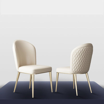 Chaise de salle à manger contemporaine nordique en cuir incurvé avec dossier rembourré et pieds effilés en métal 