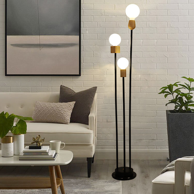 Lampe de sol industrielle rétro en fer avec cadre noir fini et trois globes en verre 