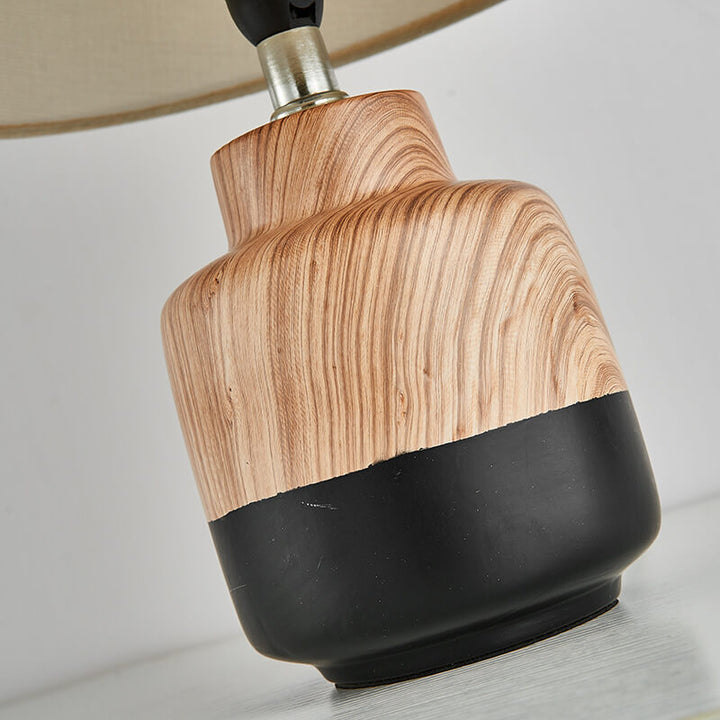 Moderne minimalistische Holzmaserung Stoff Keramik 1-Licht Tischlampe 