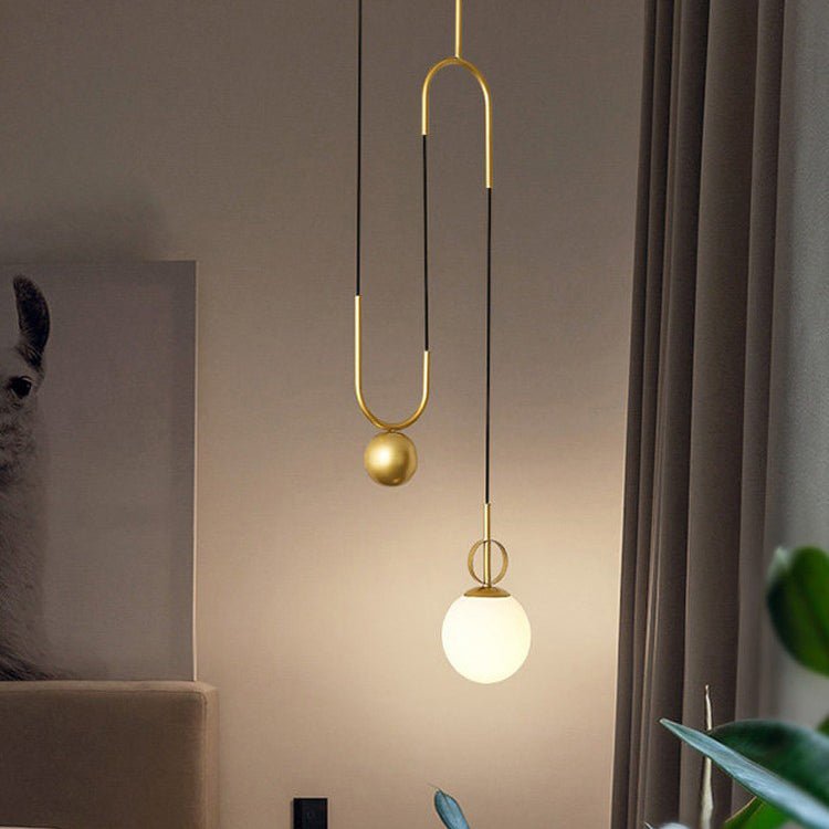 Combinación de orbe escandinavo contemporáneo de hierro curvado con vidrio, lámpara colgante de 1 luz para dormitorio 