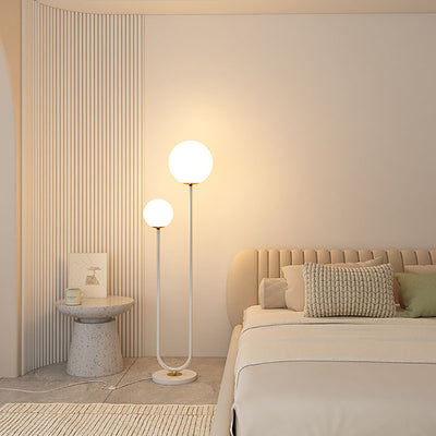 Moderner minimalistischer langer runder Ball Eisen Glas 2-Licht Stehlampe für Schlafzimmer 
