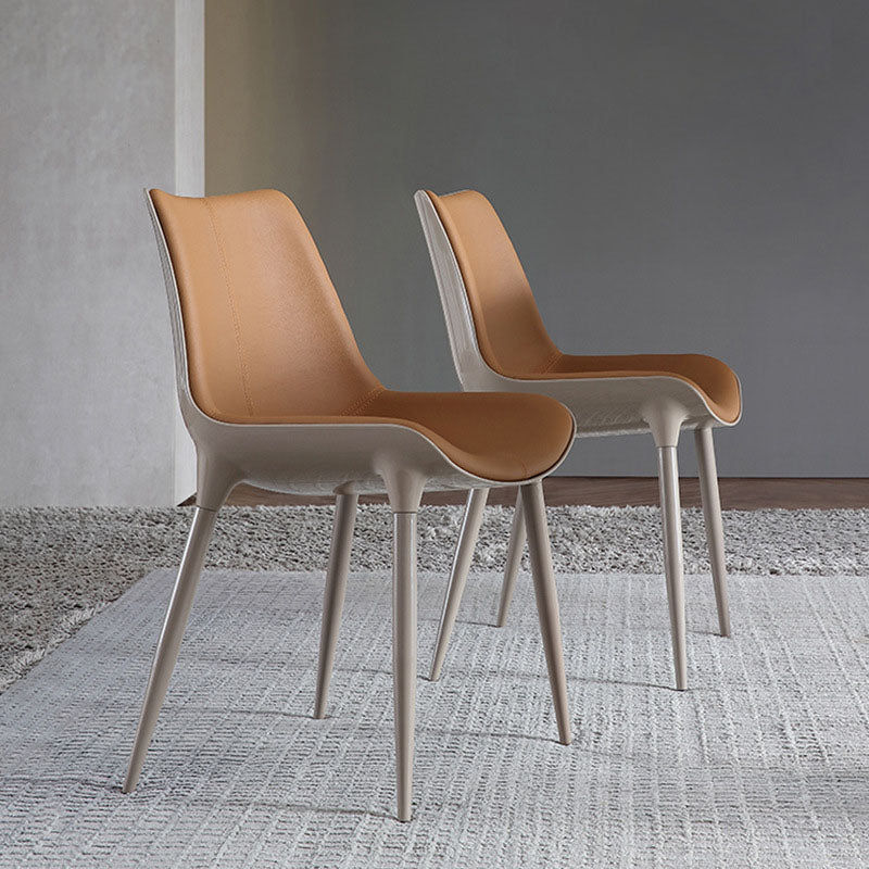 Chaise de salle à manger moderne en cuir de vache simplicité en acier éponge carrée avec dossier incurvé pour salle à manger 