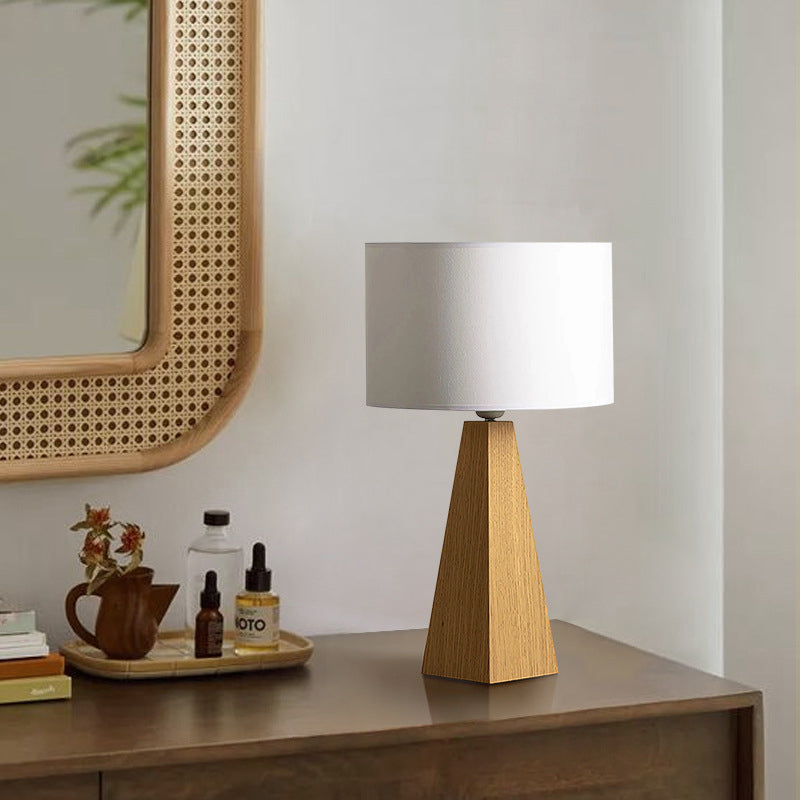 Zeitgenössische kreative zylindrische prismatische Tisch Massivholz Stoff 1-Licht Tischlampe für Schlafzimmer 