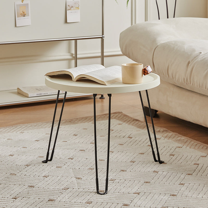 Table basse moderne minimaliste ronde en acier au carbone PP pliable pour salon 