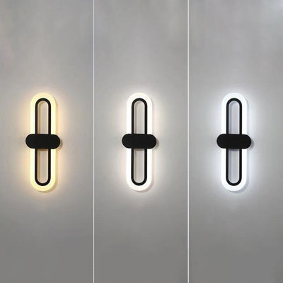 Applique murale LED en fer acrylique ovale de simplicité contemporaine pour salon 