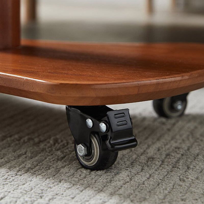 Table basse ovale minimaliste moderne en bois massif et plastique à 4 roues pour salon 