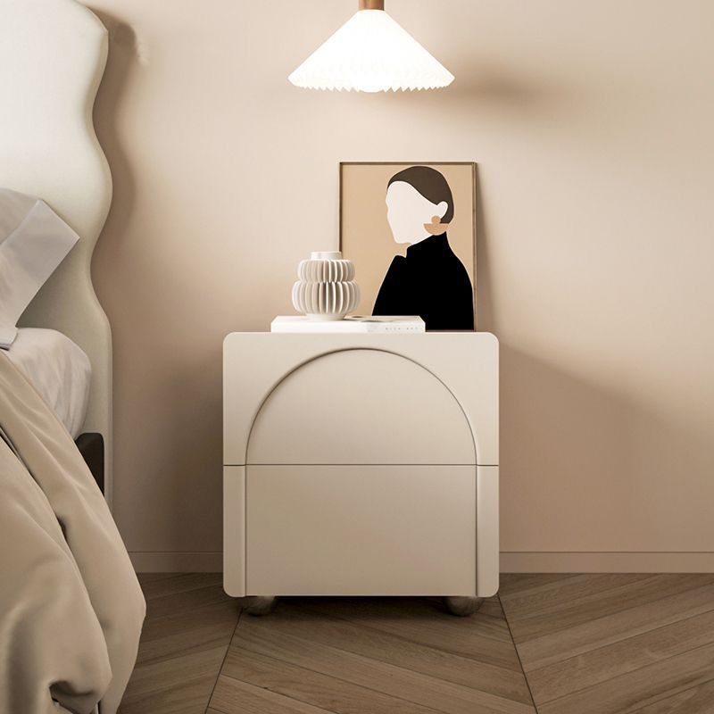 Table de nuit moderne minimaliste rectangulaire avec base ronde en acier au carbone et 2 tiroirs pour chambre 