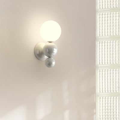 Applique murale moderne pour enfants en fer forgé style crème avec une sphère et une lumière 