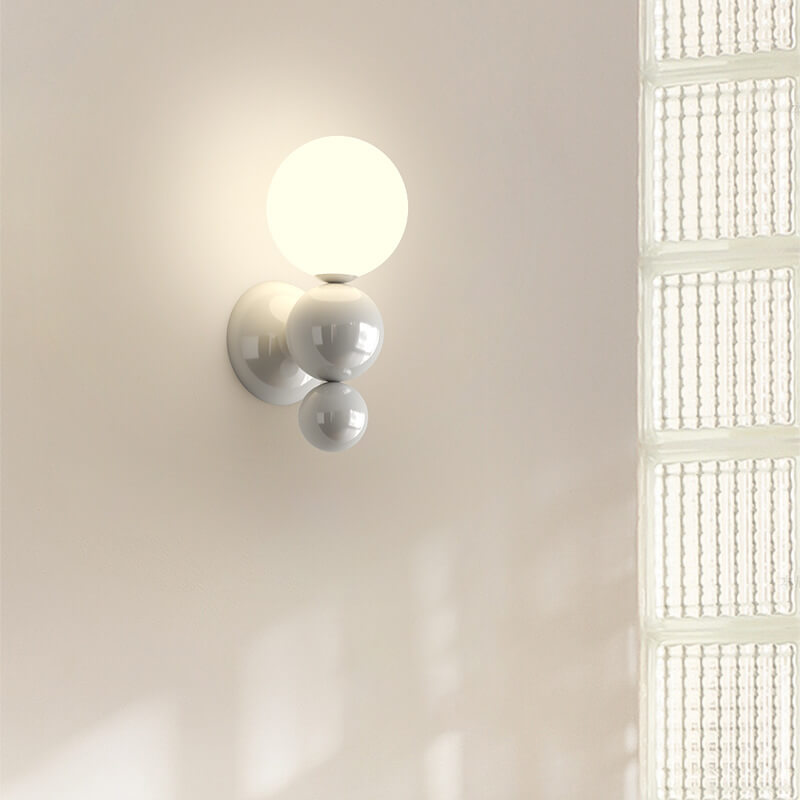 Applique murale moderne pour enfants en fer forgé style crème avec une sphère et une lumière 