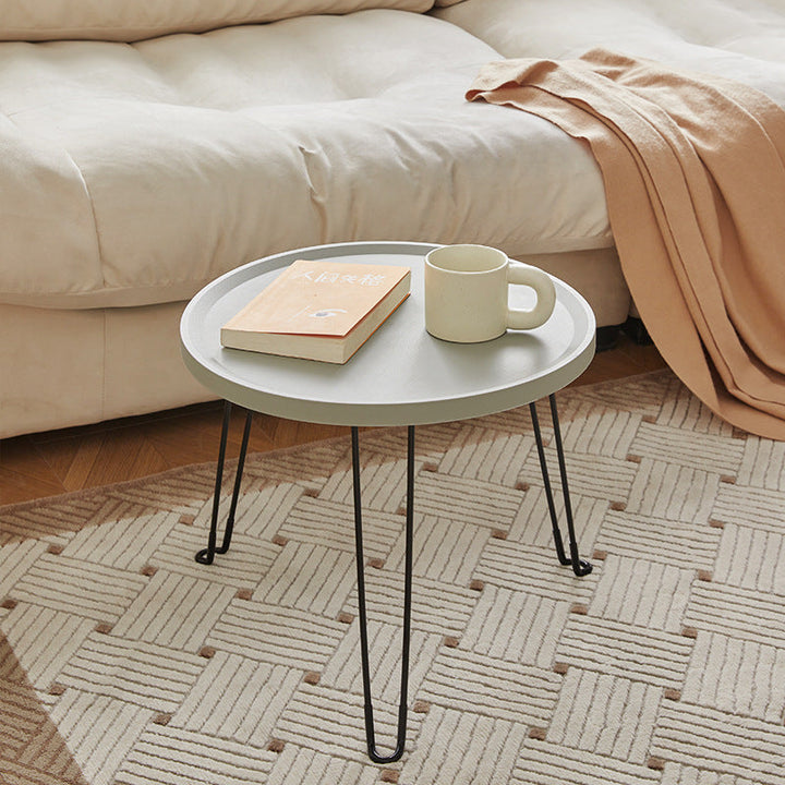Table basse moderne minimaliste ronde en acier au carbone PP pliable pour salon 